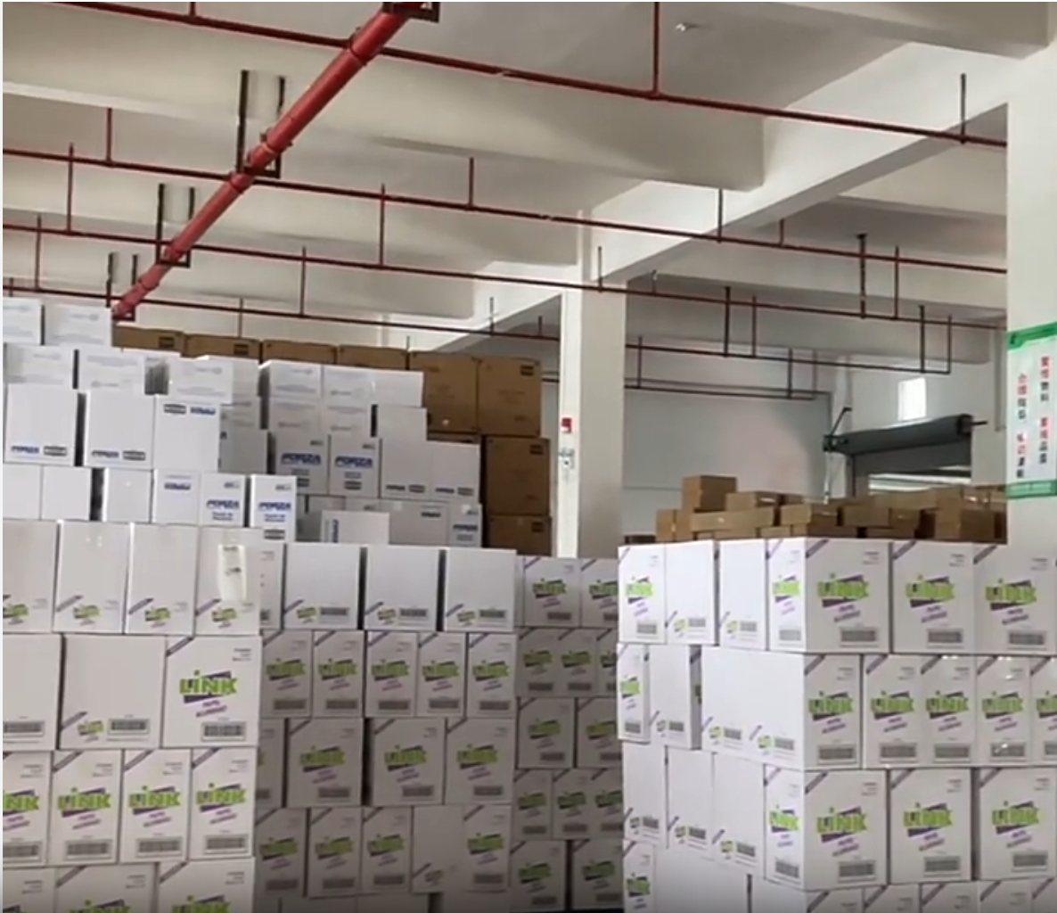 Aluminum pan cartons staged in supplier warehouse