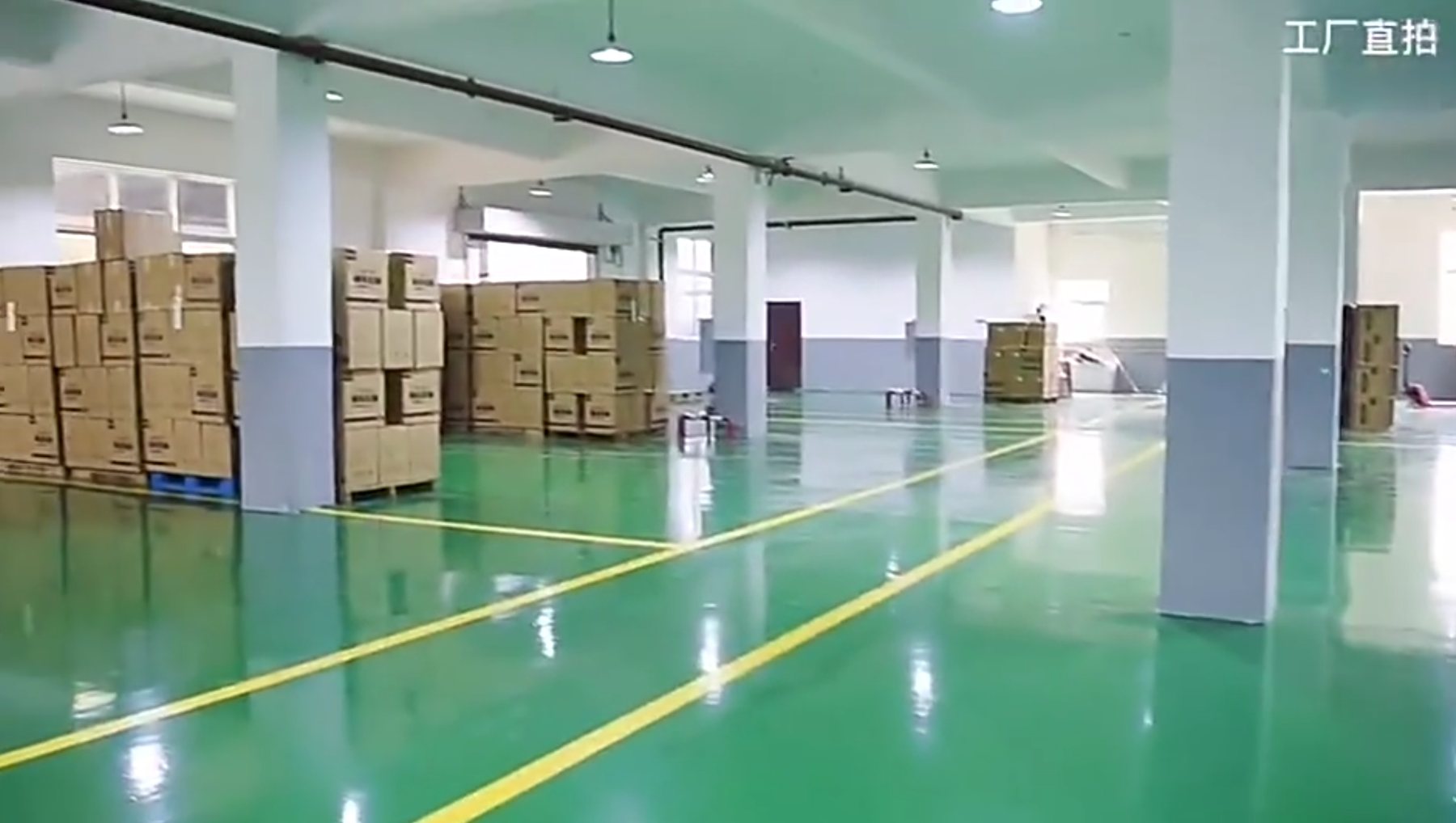 Clean supplier production floor with packed goods and equipment