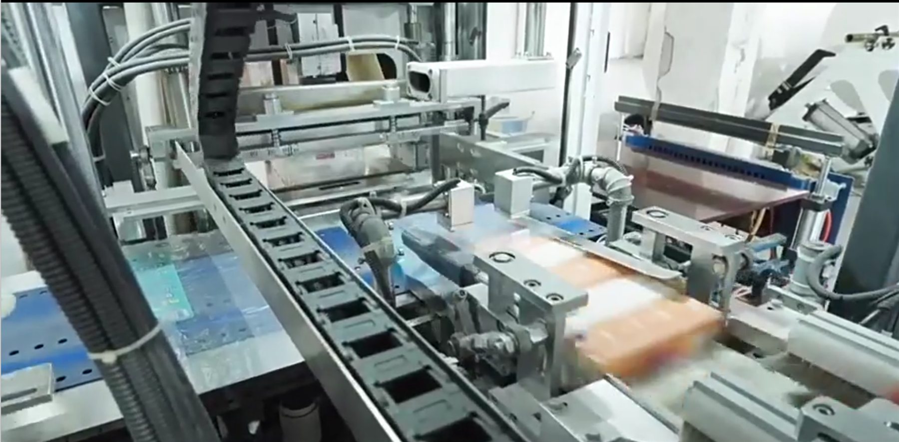 Automated tissue production equipment running inside a supplier factory