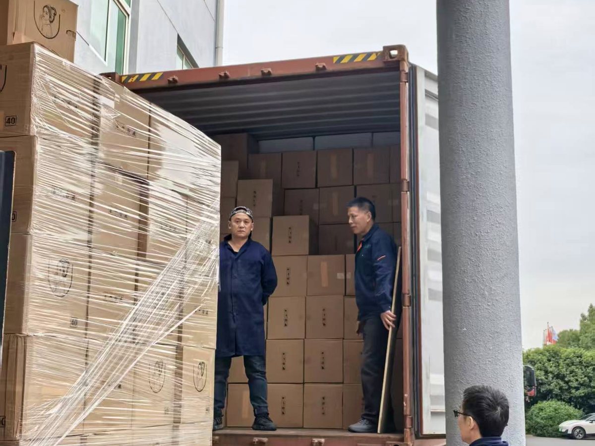 Cartons being loaded into a shipping container in China